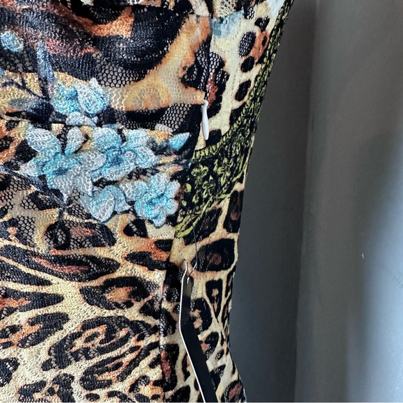 Printed lace order sleeve animal and floral print body con dress. - Picture 8 of 11